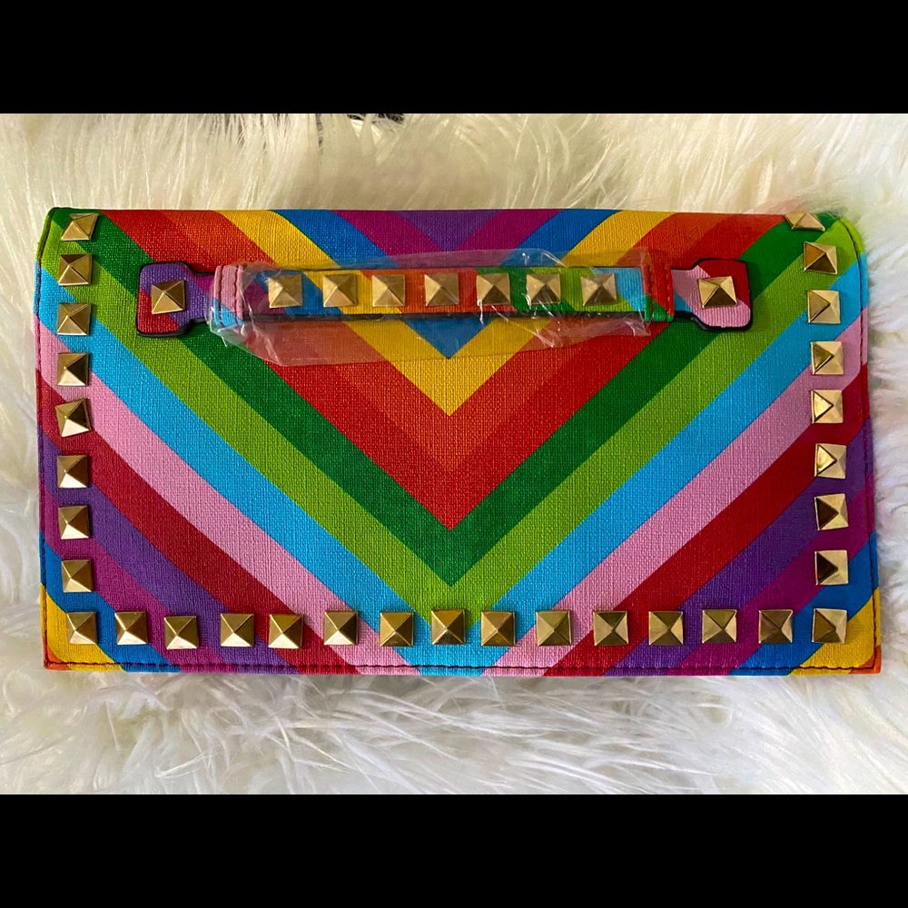 Studded rainbow clutch bag